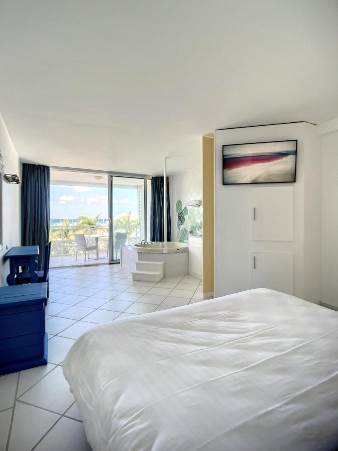 Le Domaine Anse Marcel Beach Resort Exteriör bild
