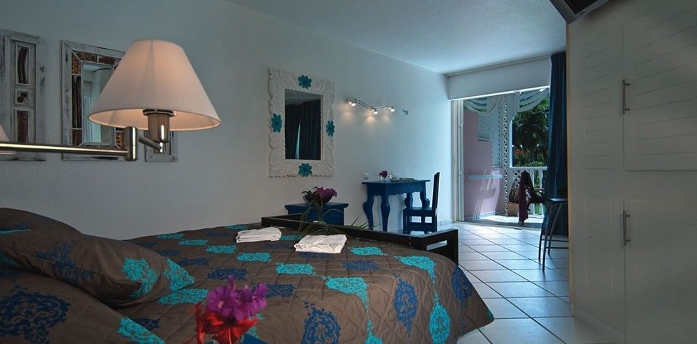 Le Domaine Anse Marcel Beach Resort Exteriör bild